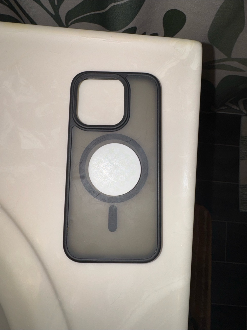 Clear Black MagSafe-Compatible iPhone 15 Pro Case with pop socket